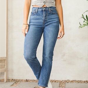 Levi's Wedgie jeans in faded blue with light distressing